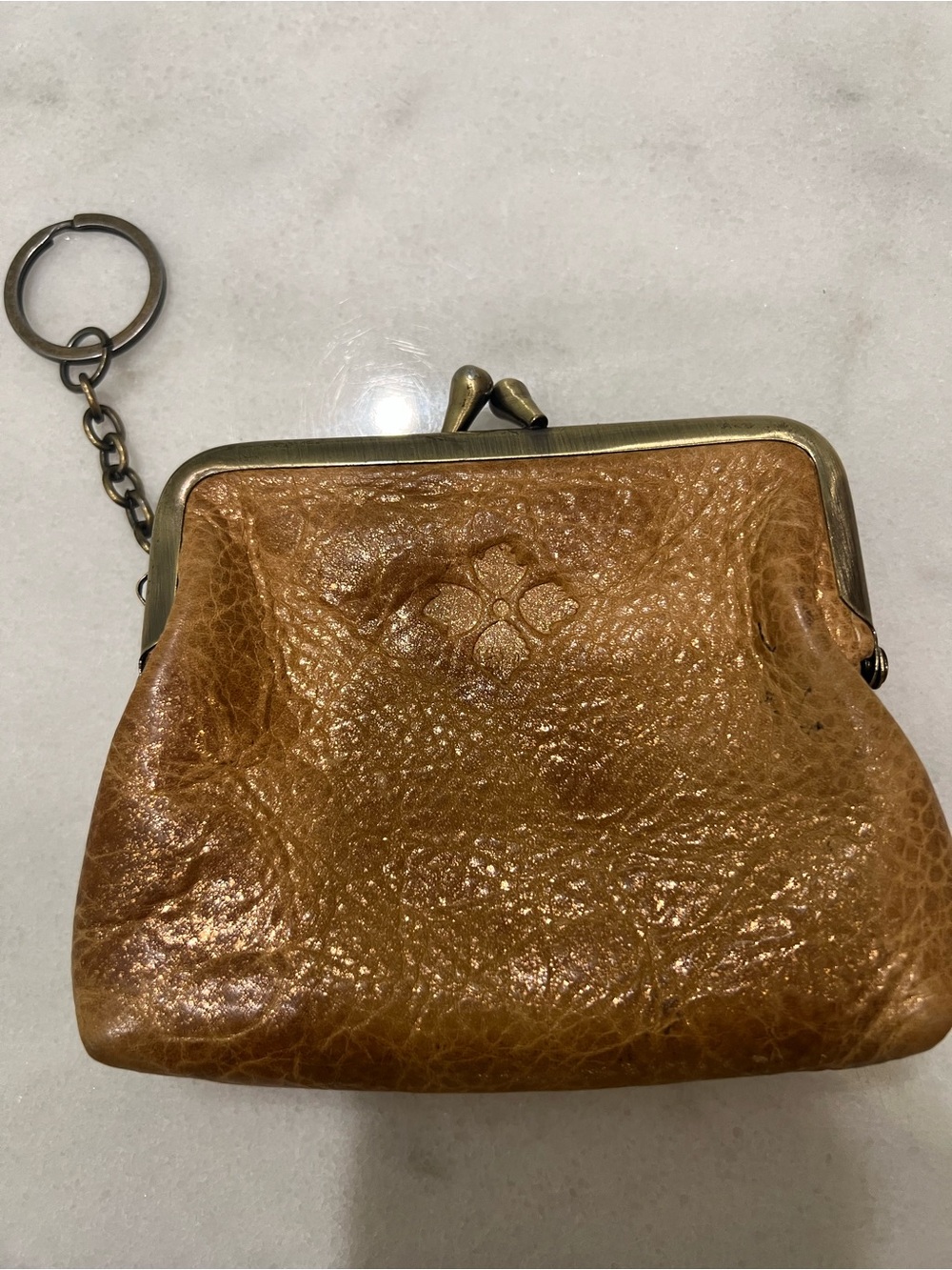 Patricia Nash tan leather kiss-lock coin purse antique brass-tone